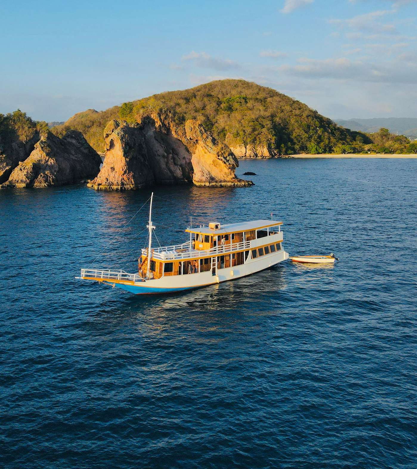 New Pandawa liveaboard boat sailing on the blue waters of Komodo National Park